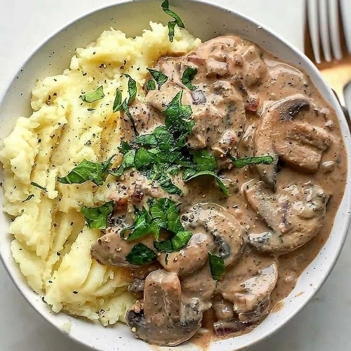 Mushroom Stroganoff with fluffy mashed potato by