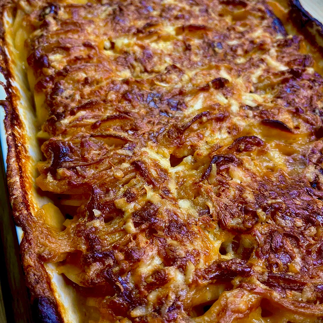 Cheesy Caldareta Scalloped Potatoes 