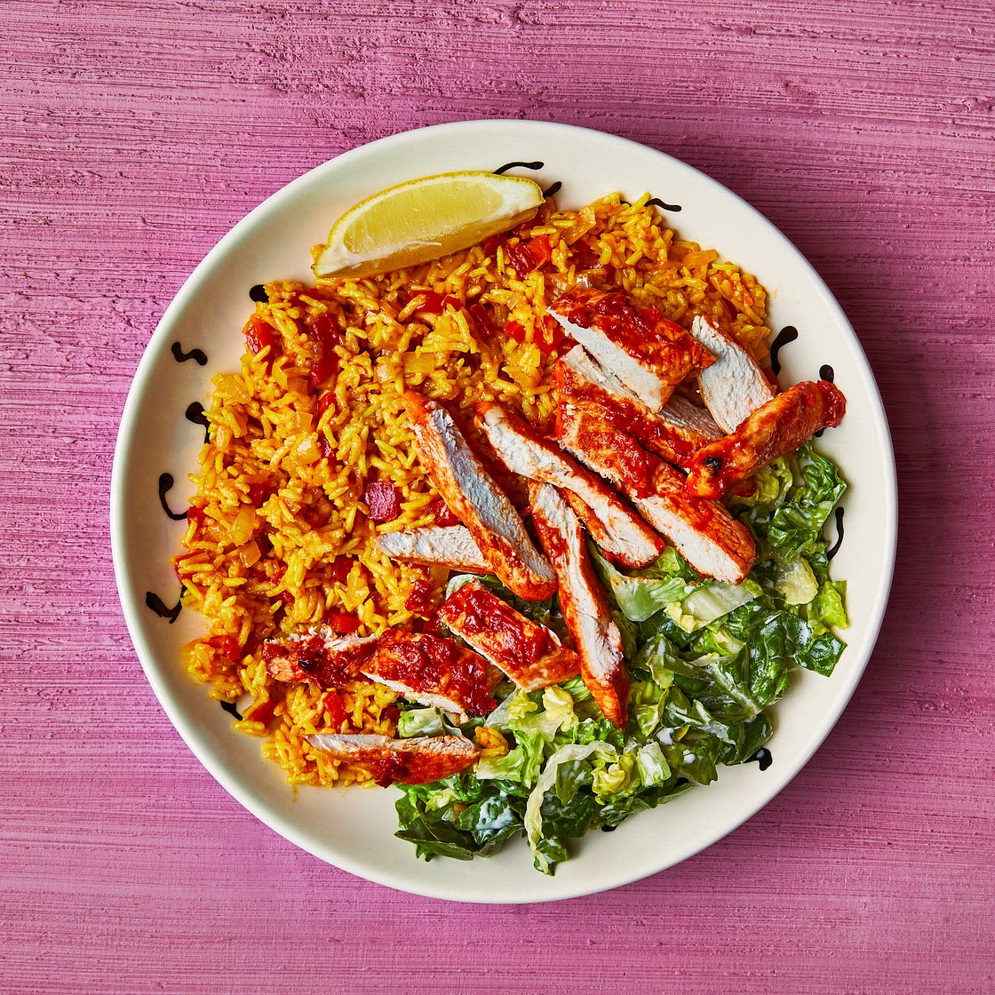 Peri peri chicken with spicy rice and lemony salad