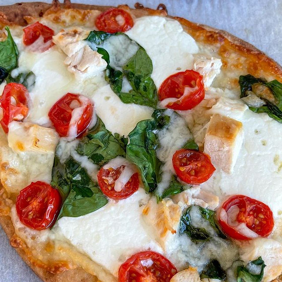 If you’re looking for a quick and easy dinner idea these naan pizzas are the way to go. They are delicious and super simple to make, I got the garlic naan and everything else from Aldi. You can definitely leave it just veggies and cheese or you can add chi