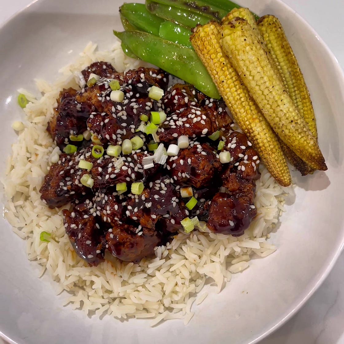 Air fried crispy sesame chicken