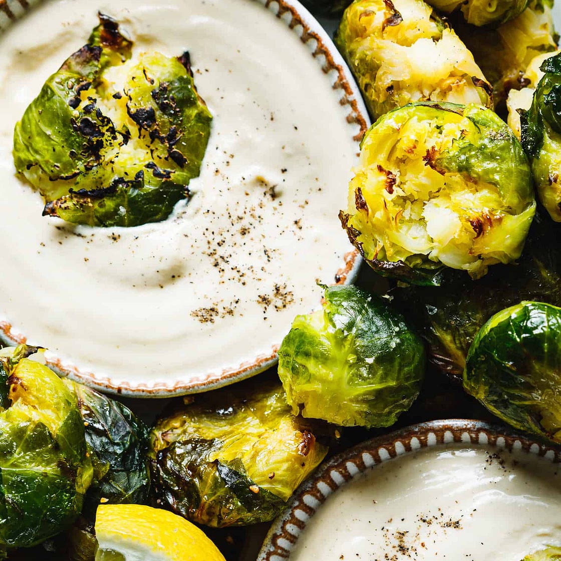 Gluten-Free Smashed Brussels Sprouts with Lemon Tahini Dressing