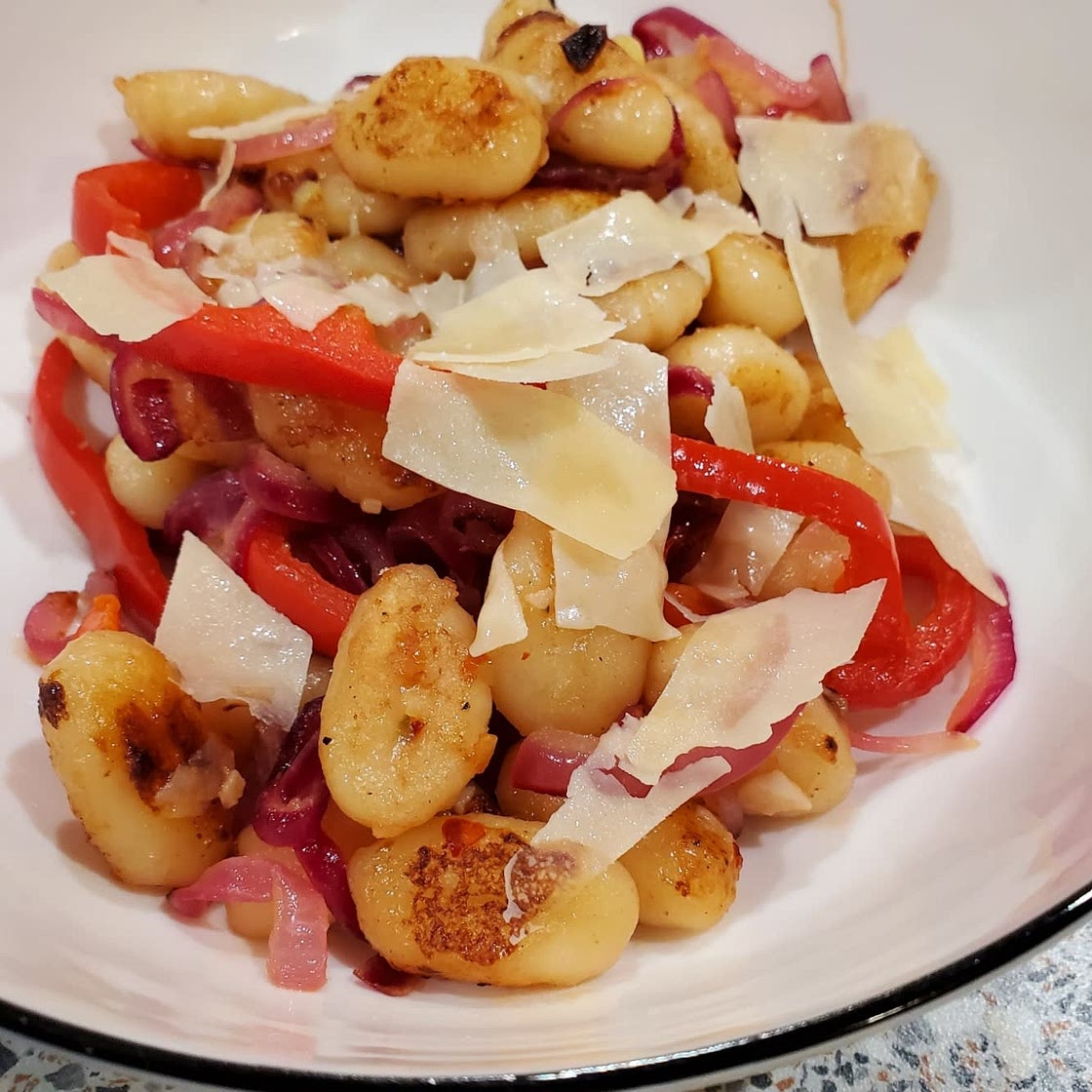 Crispy Pan Fried Gnocchi with a Sweet Bell and Onion Salad