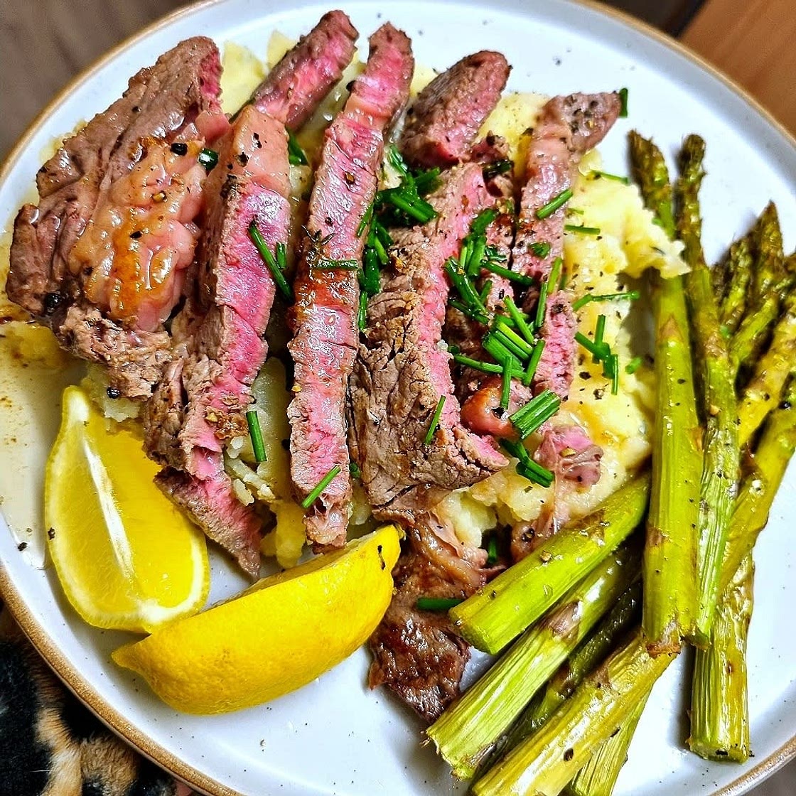 Butter-Basted Rib-Eye Steak with Thyme-Infused Mashed Potatoes and Asparagus