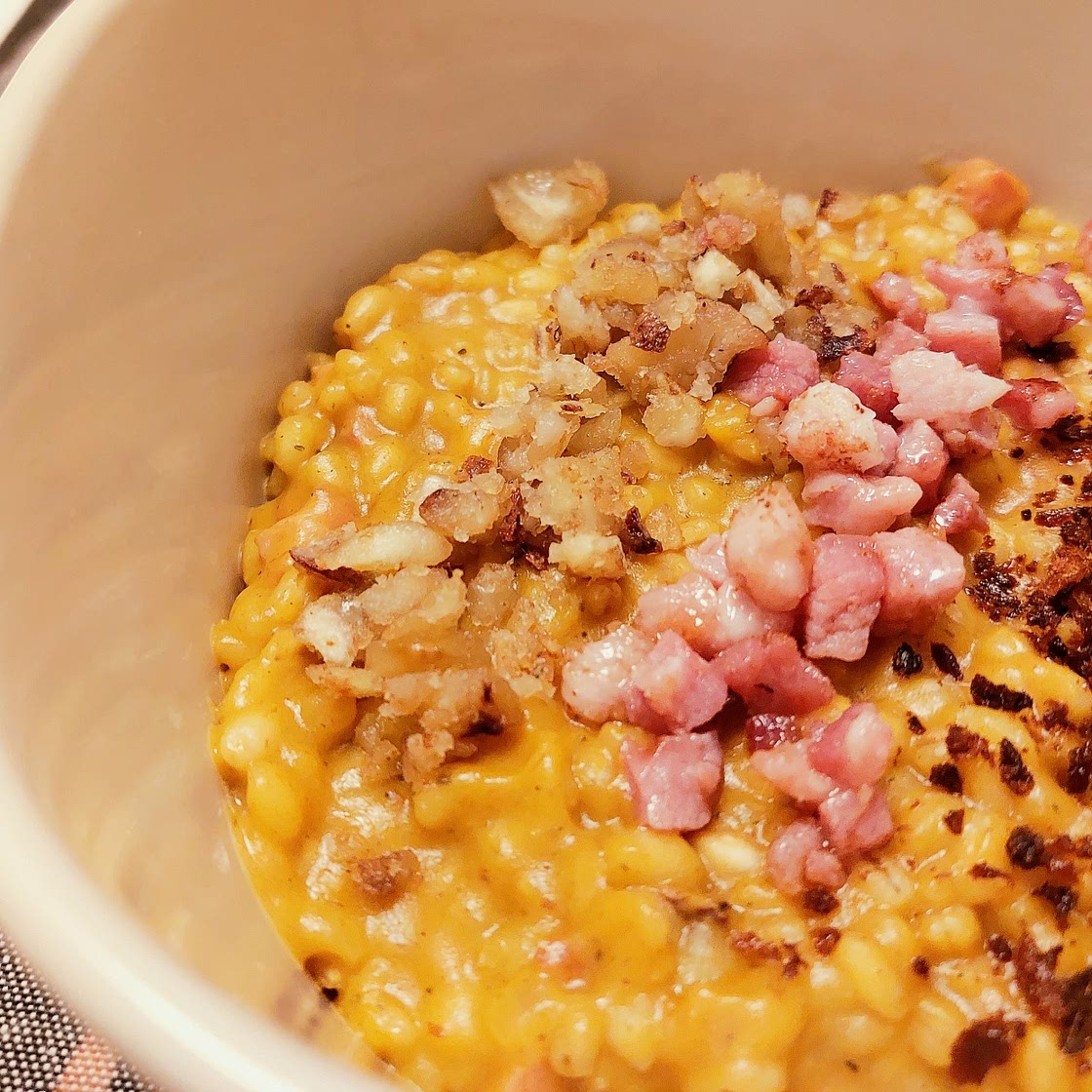 Orzotto - Pumpkin, chestnuts, bacon and anchovies powder