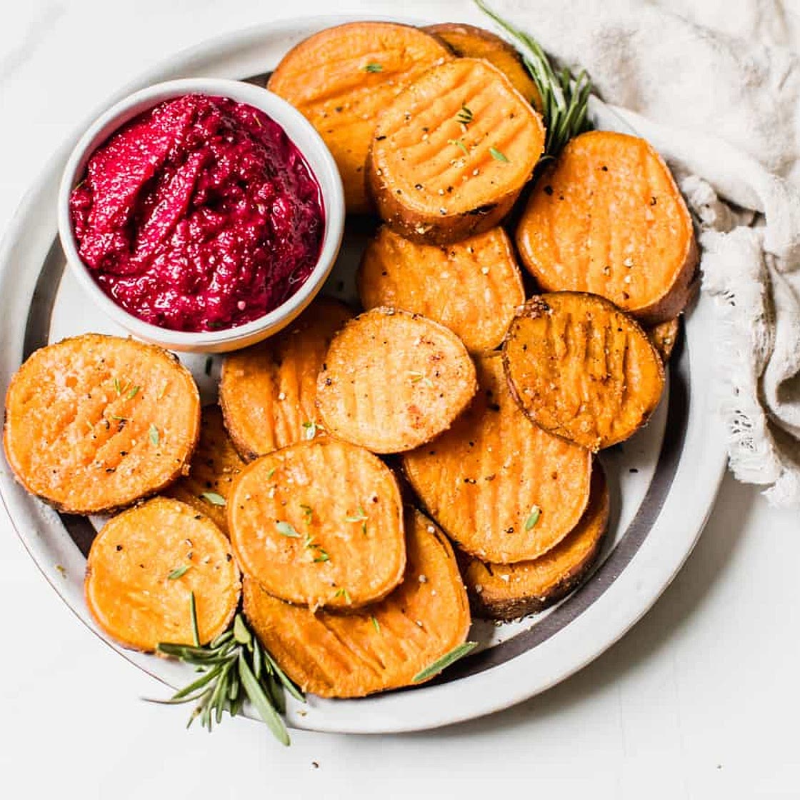 Smashed Sweet Potatoes with Beet Garlic Aioli
