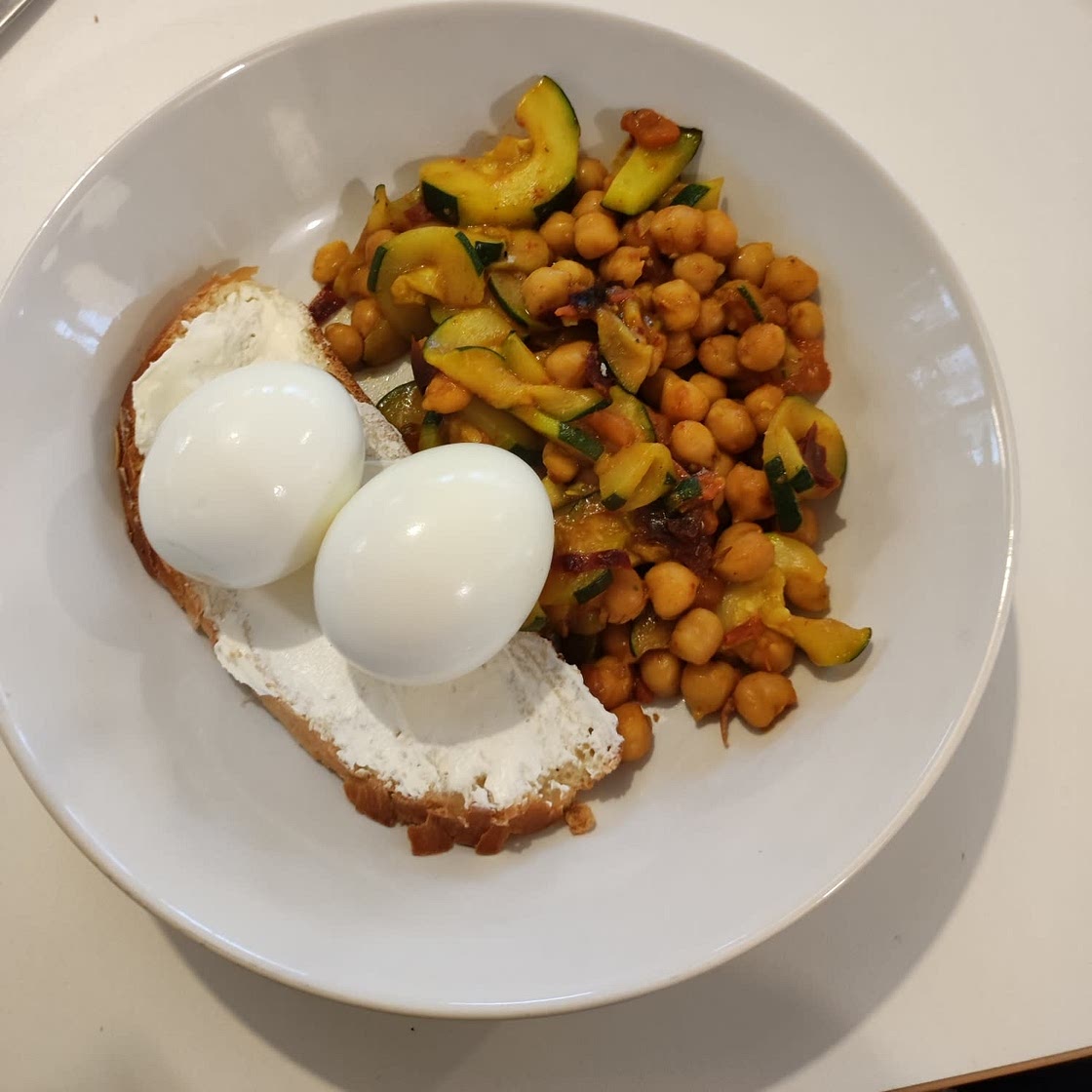 Indian chickpeas with poached eggs