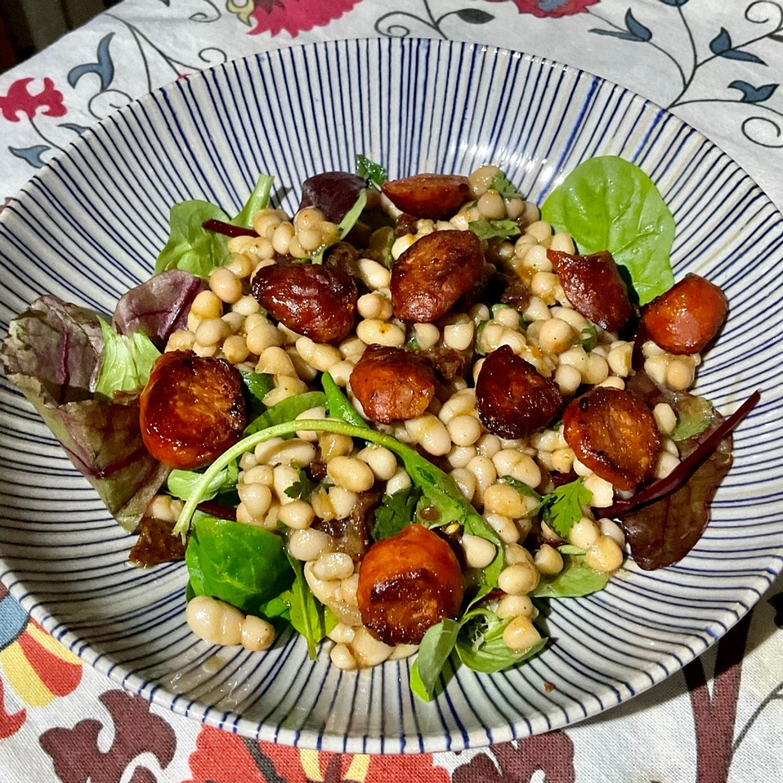 Chorizo on Middle Eastern Pomegranate Molasses Haricot Beans