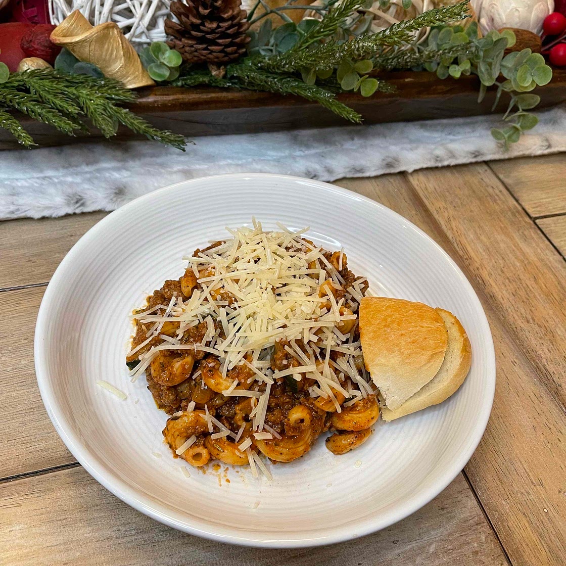 Beef Cavatappi Bolognese with sautéed Zucchini & Parmesan