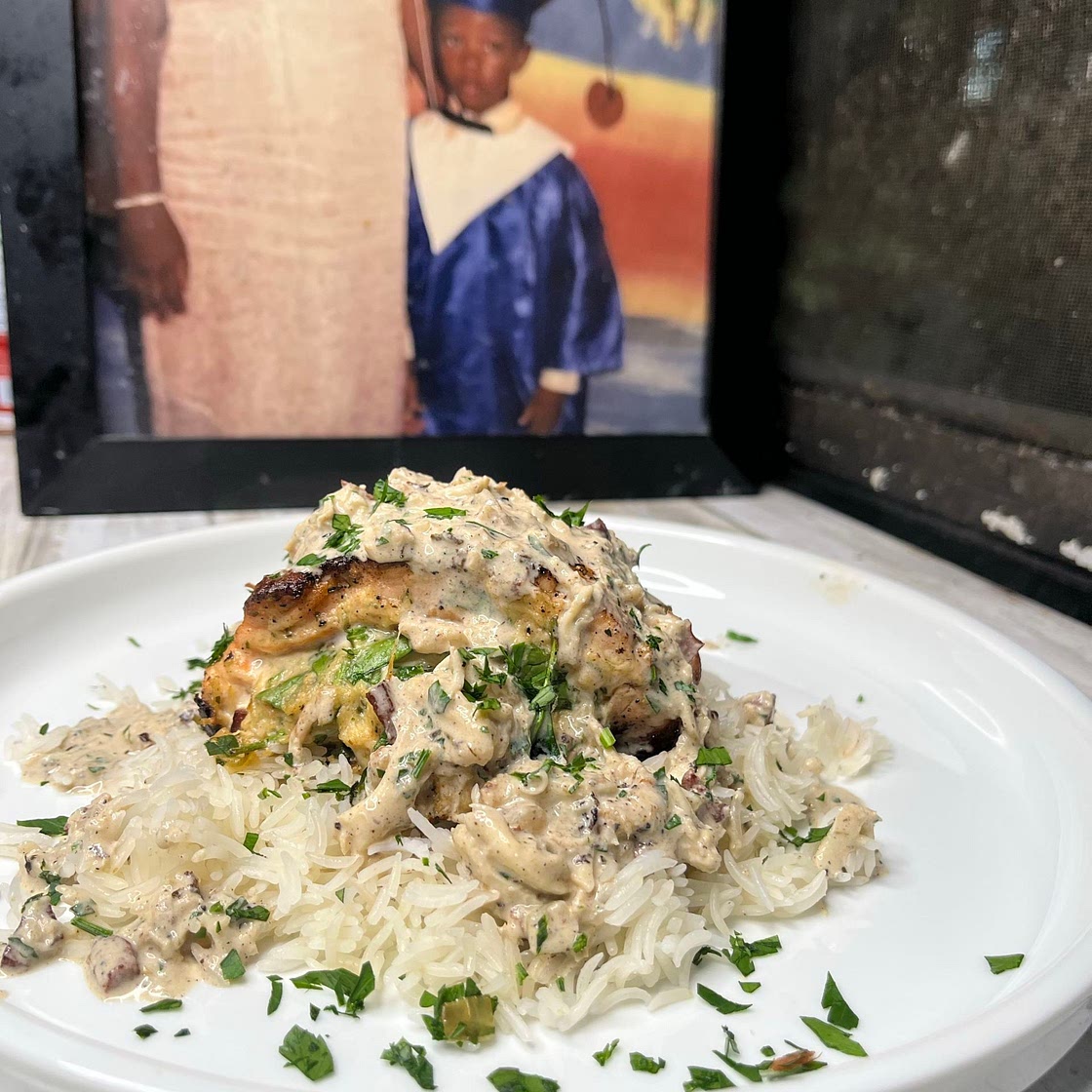 Spinach & Crab Stuffed Salmon with a jerk cream sauce