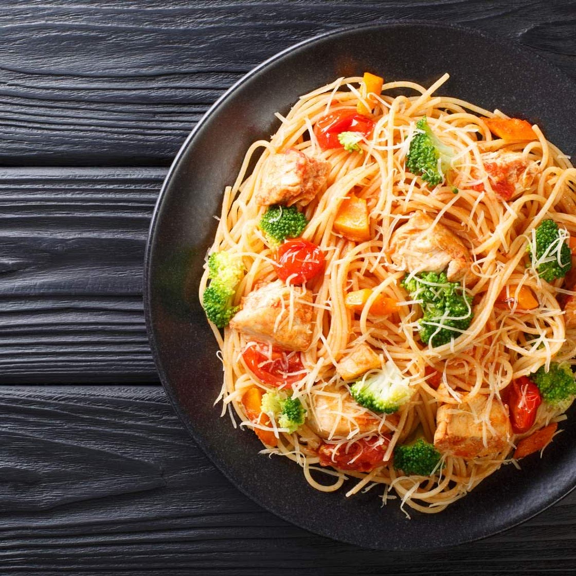 Lemon Chicken Spaghetti Squash with spinach and tomatoes 