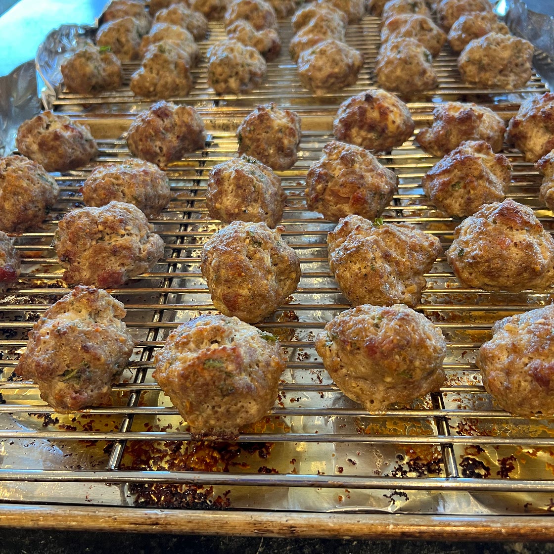 Classic Spaghetti and Meatballs for a Crowd Cook's Illustrated. Serves 12