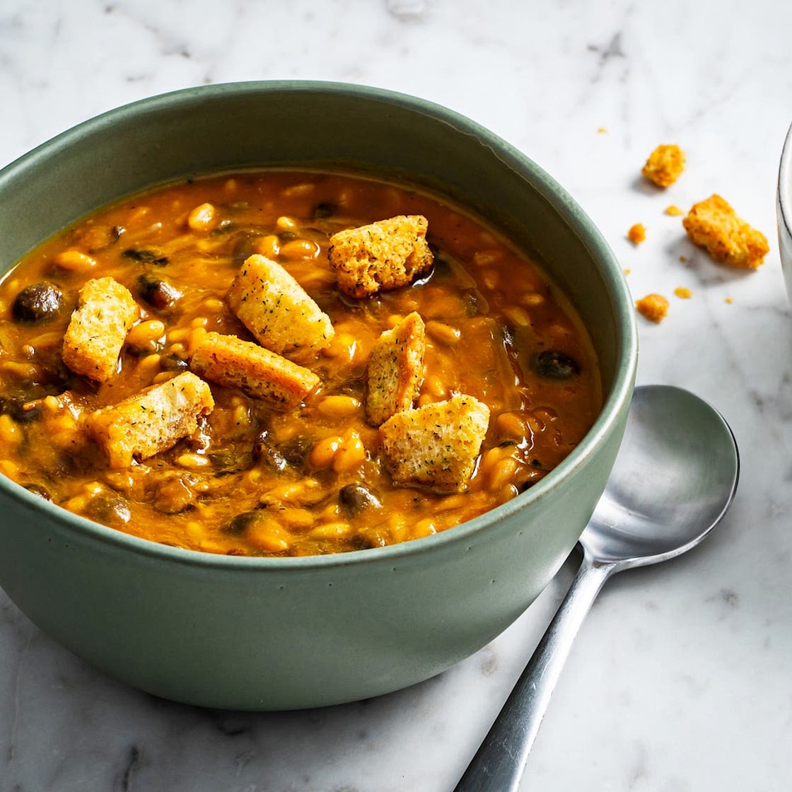 This black bean and pumpkin stew is hearty, pantry-friendly and ready in 20 minutes