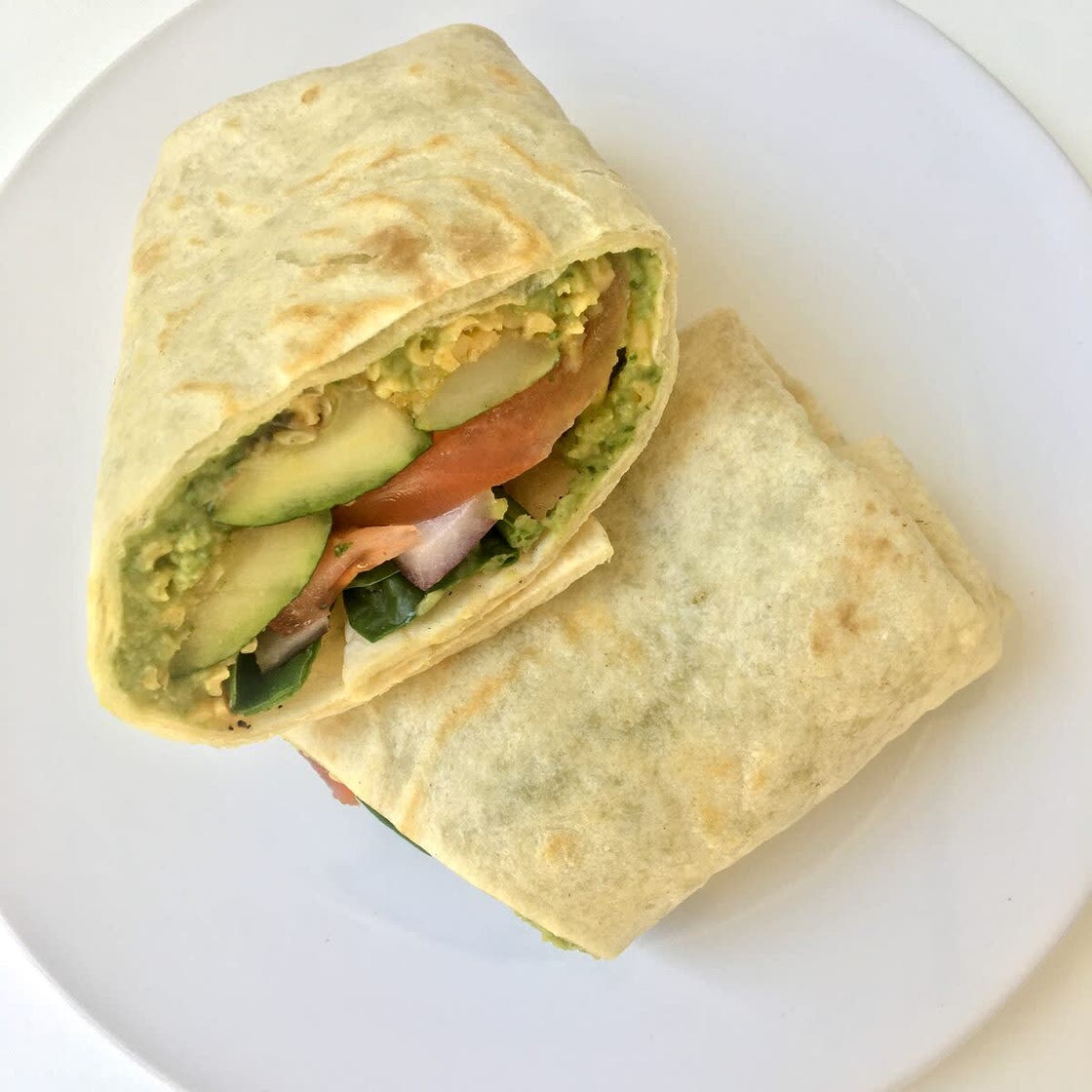 Shrimp tortilla with hummus and vegetables