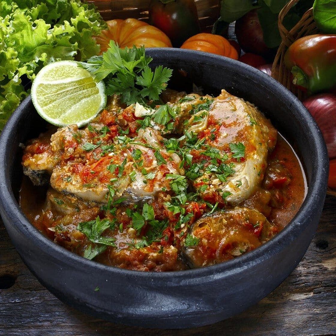 Tender fish in a spicy tomato sauce with coconut milk