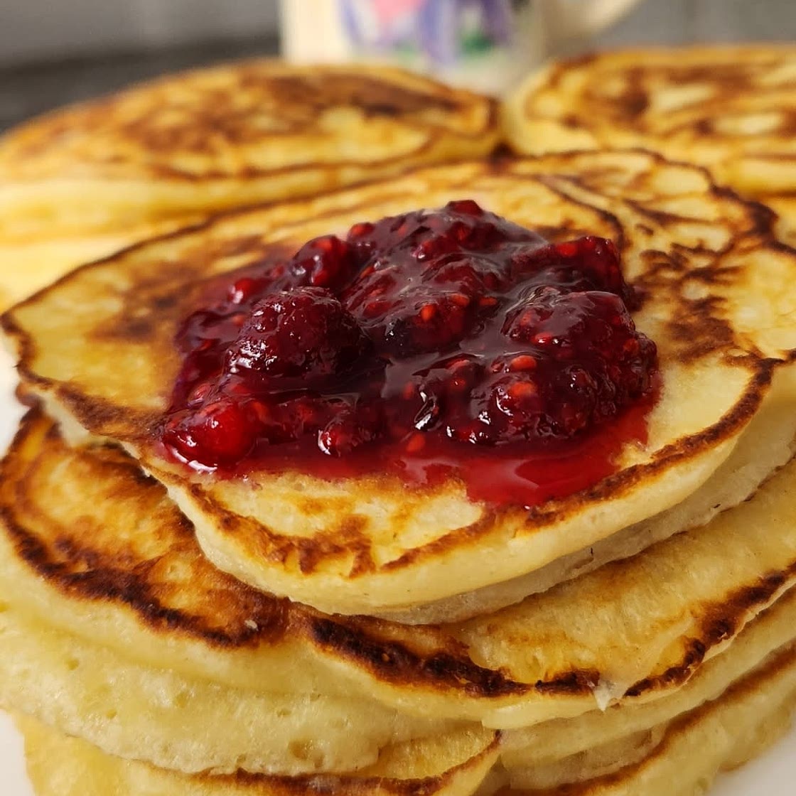 Lemon Ricotta Pancakes with Raspberry Syrup