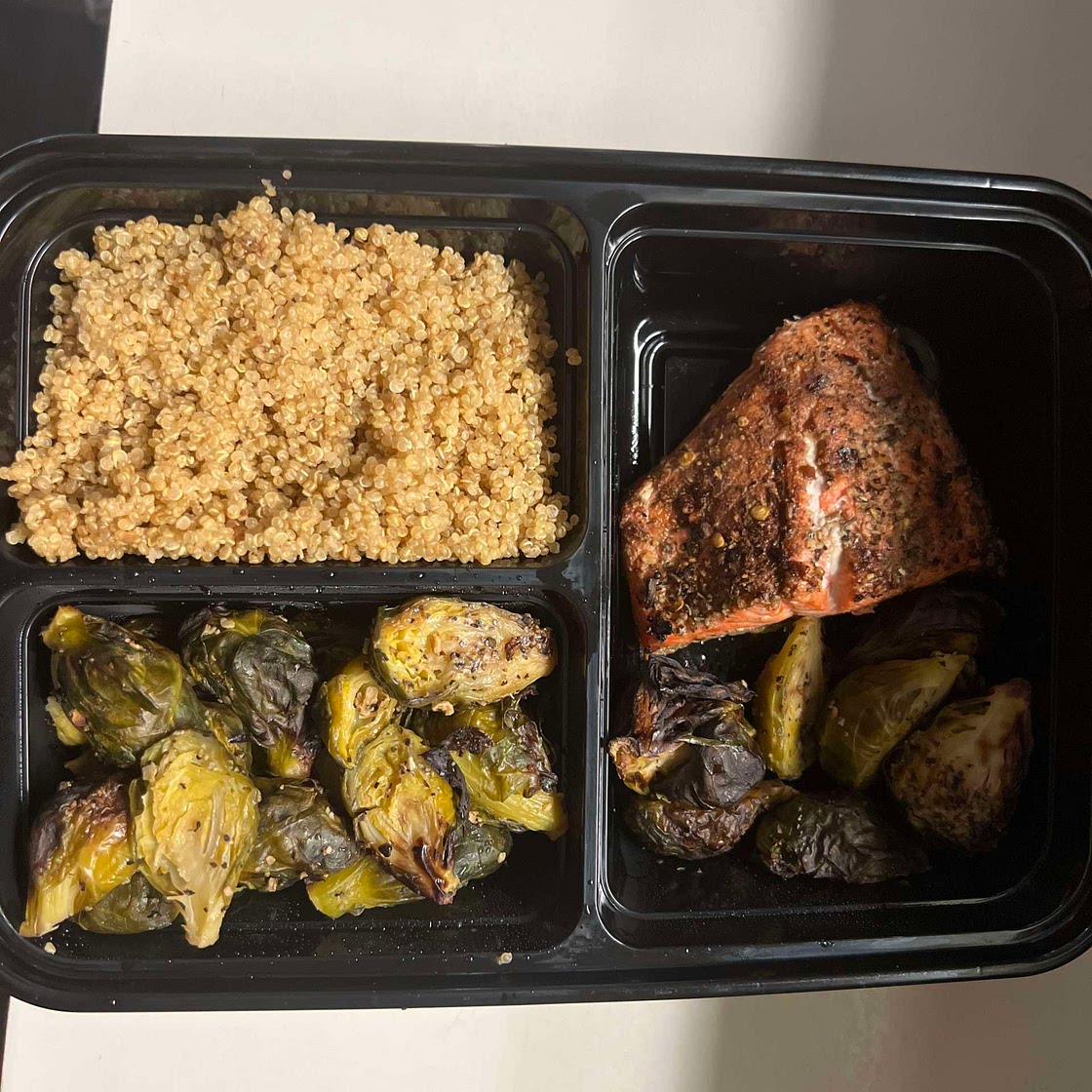 Herb crusted grilled salmon, roasted Brussel sprouts and quinoa