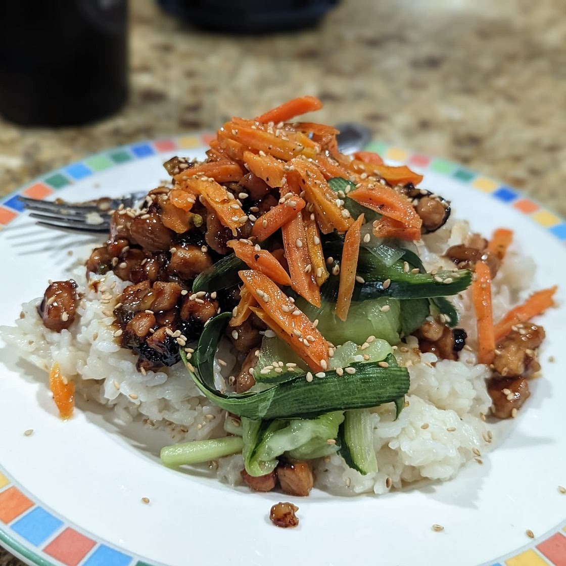 Pork Bulgogi Bowls with Carrots, Pickled Cucumber, & Sriracha Cr