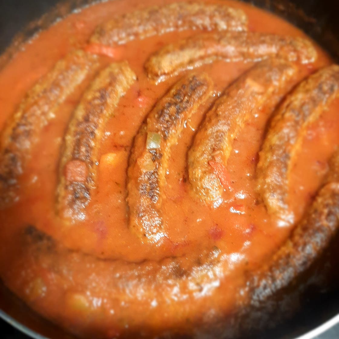 Sweet Italian Sausage w/ peppers and onion in marinara sauce