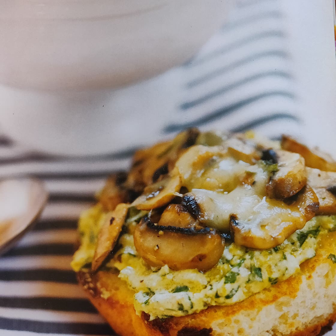Tartine with walnut, lemon, and ricotta pesto and sauteed mushrooms