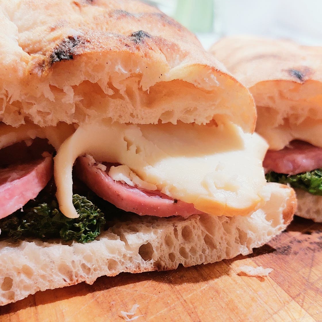 Panini - Kale, ciauscolo salami scamorza and dried tomatoes