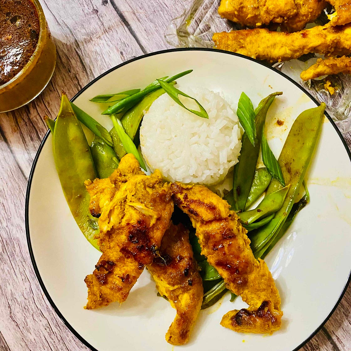 Grilled chicken satay bowl with peanut sauce