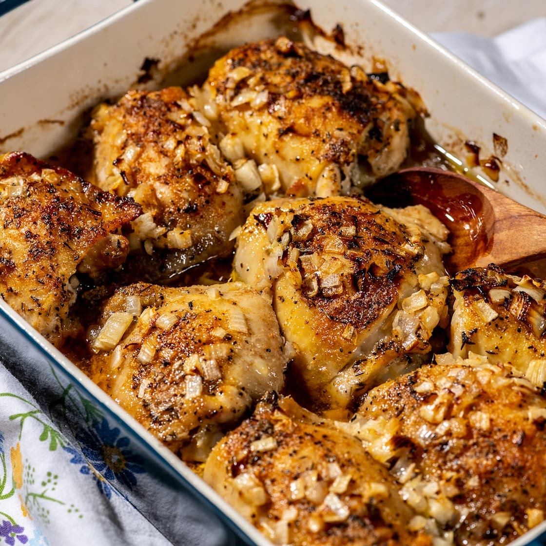 Baked chicken thighs with butter and onions are an ode to a childhood spent cooking with Mom