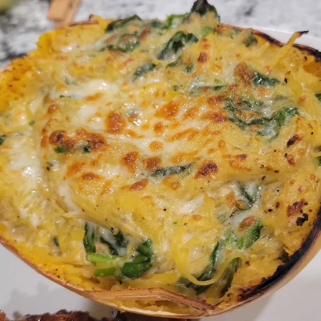 Baked Spaghetti Squash Alfredo with Spinach and Sundried Tomatoes