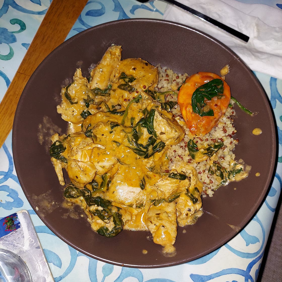 Cream Tomato Spinach Chicken on Quinoa