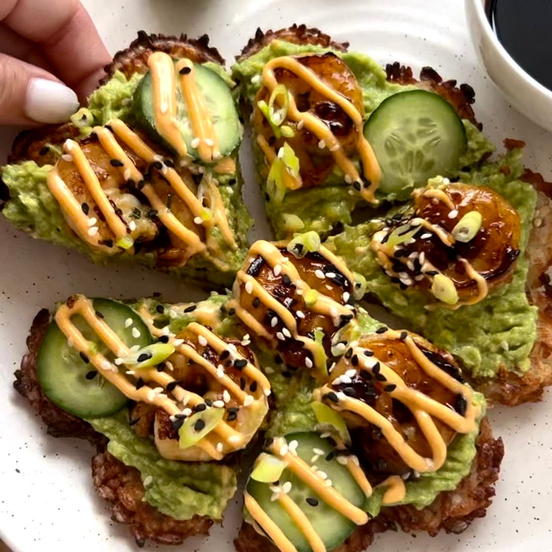 TERIYAKI PRAWNS & AVOCADO ON A CRISPY RICE WAFFLE.