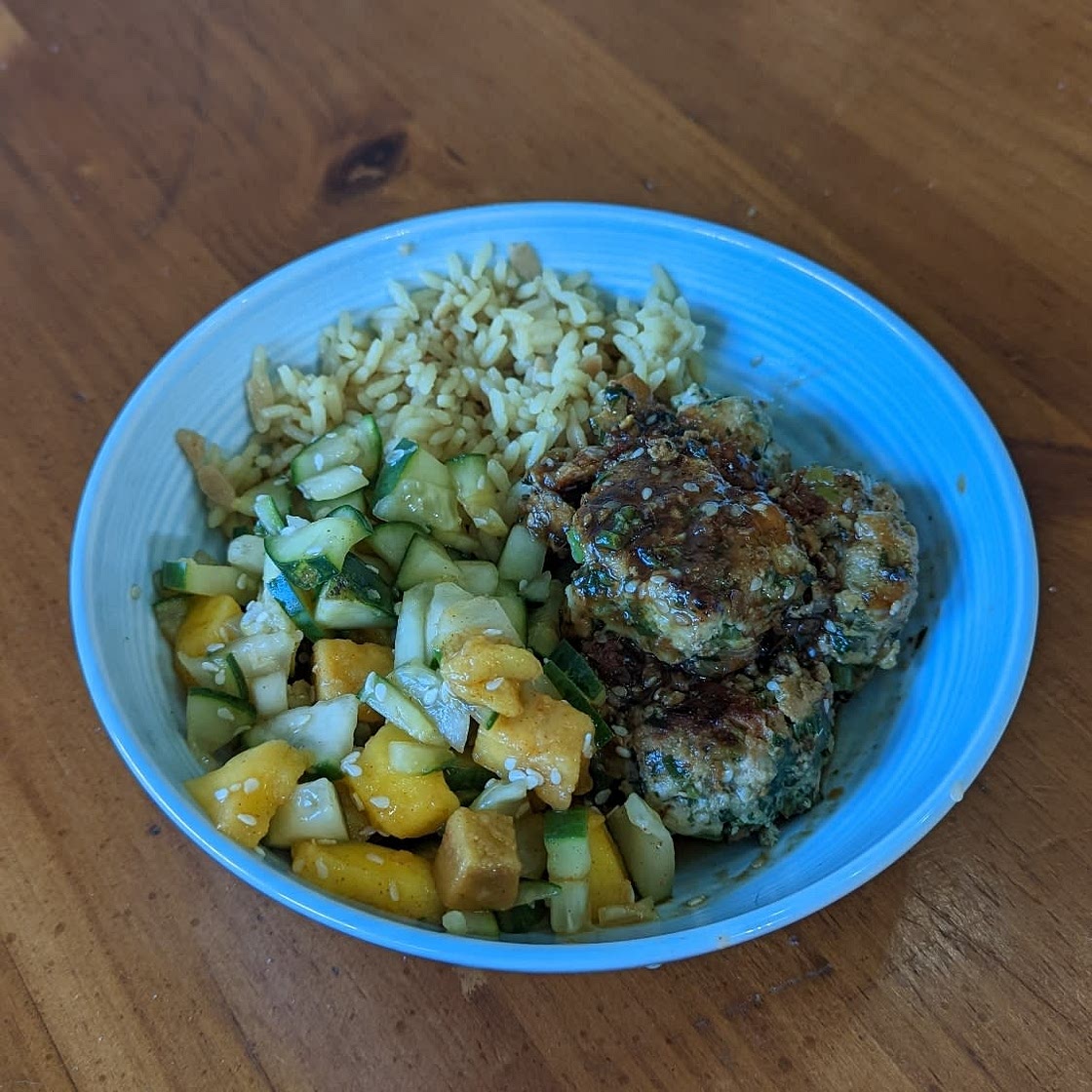 Sweet and Spicy Sesame Meatball Bowl with Mango Cucumber Salad