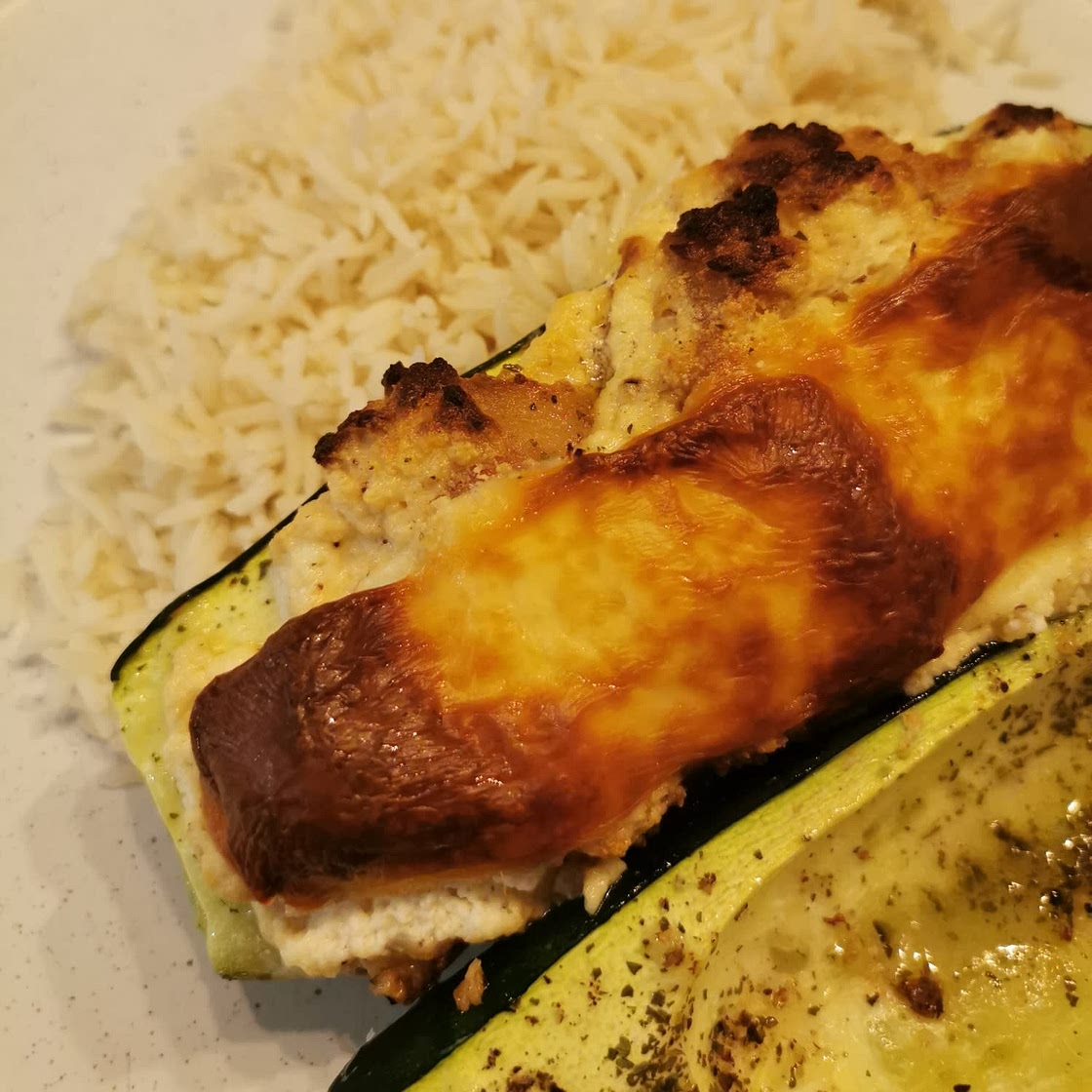 Courgettes farcies à la ricotta et aux lardons
