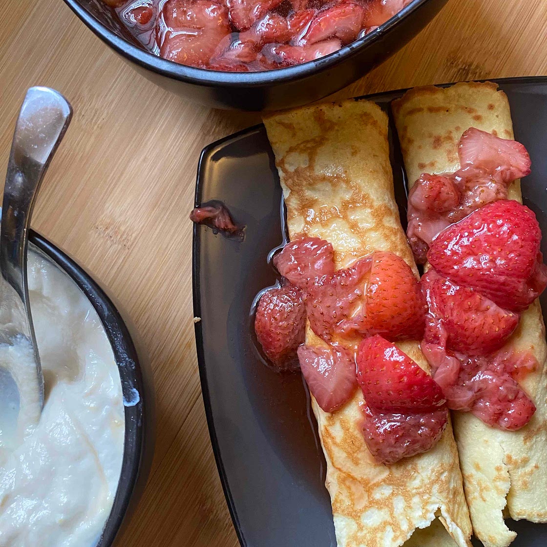 Coconut flour crepes with maple ricotta and strawberry syrup