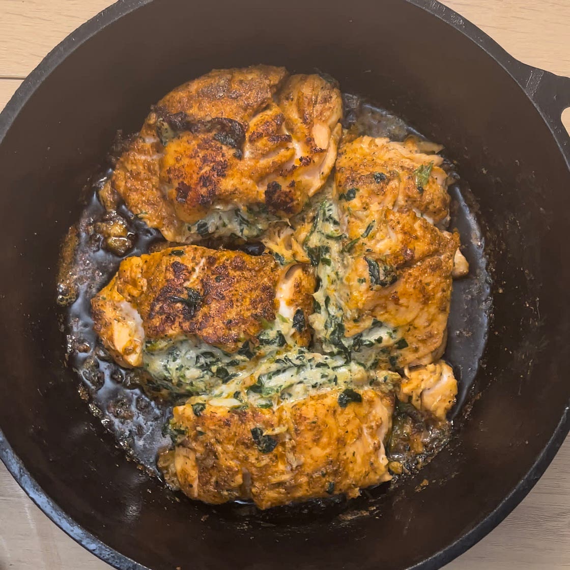 Crab Stuffed Salmon With A Spicy Butter Garlic Sauce 