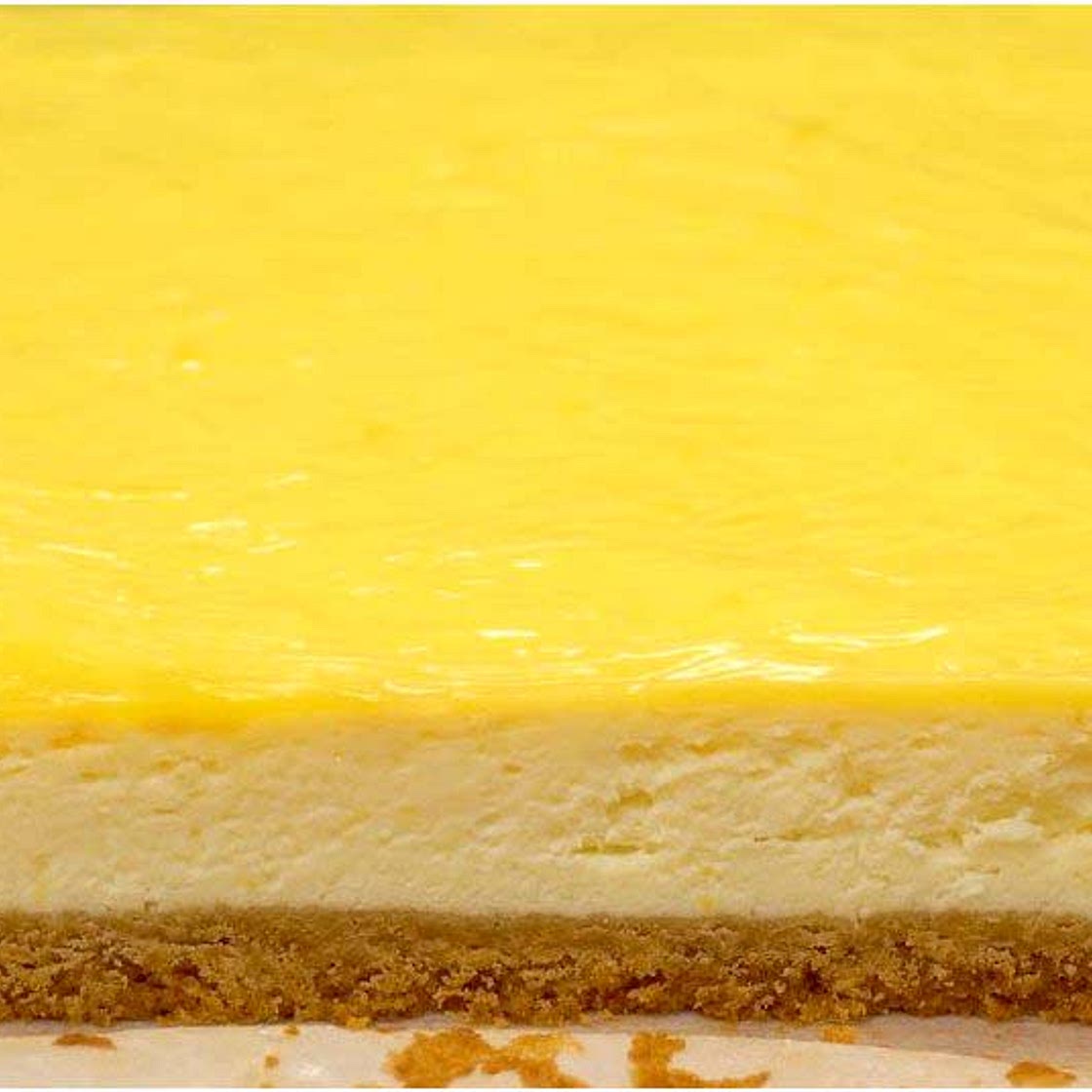 New York Cheesecake With Lemon Topping Yumm