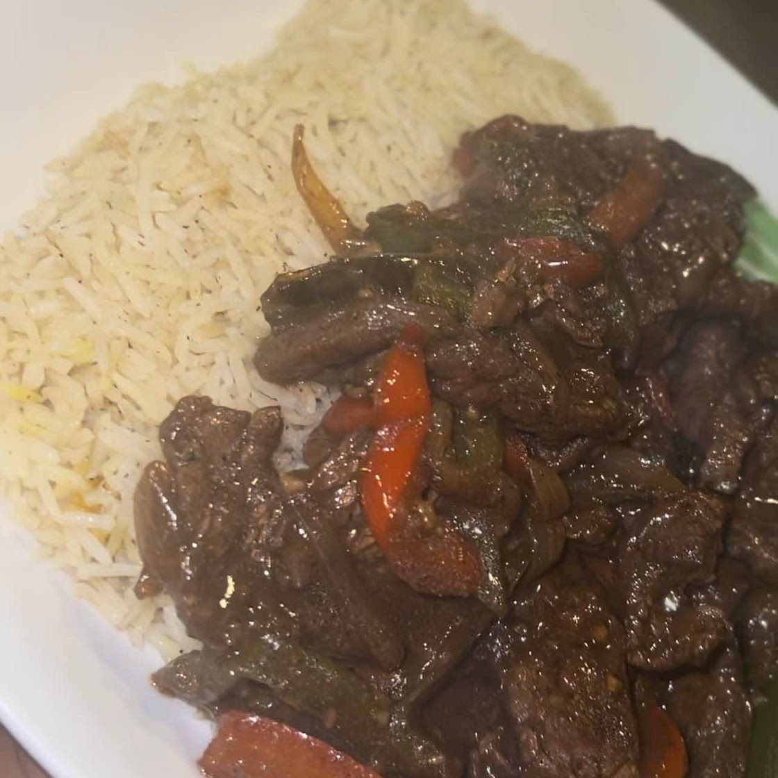 Sauteed Steak + Peppers w/ a side of rice