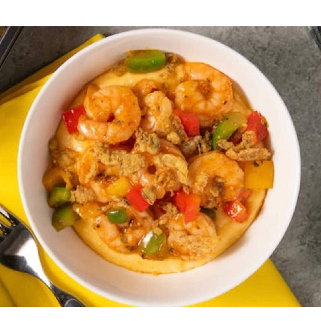 Shrimp and Grits Bowl with crispy jalapeños