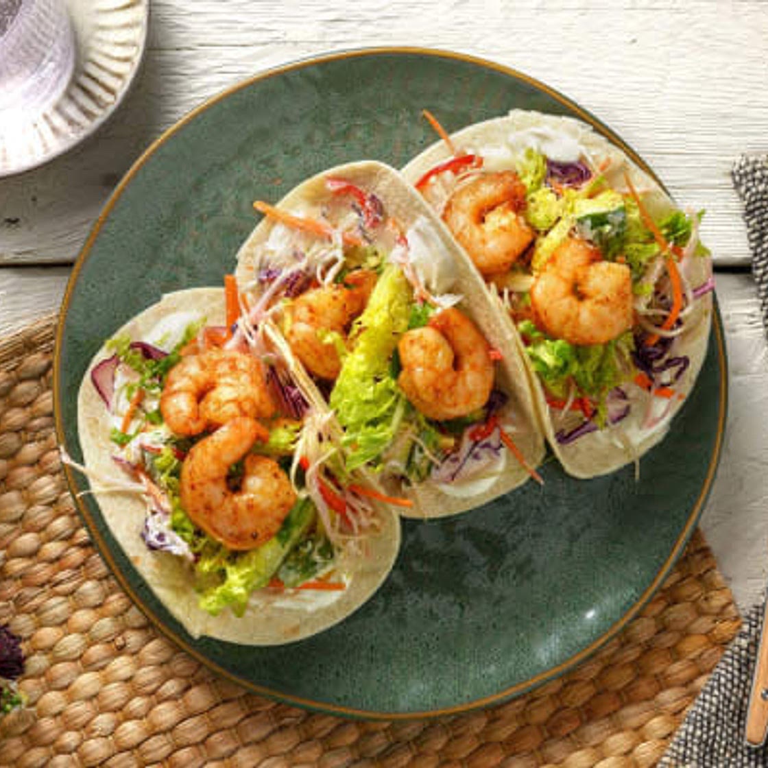 Smoky King Prawn Tacos
with Avocado Coleslaw and Lime Yoghurt