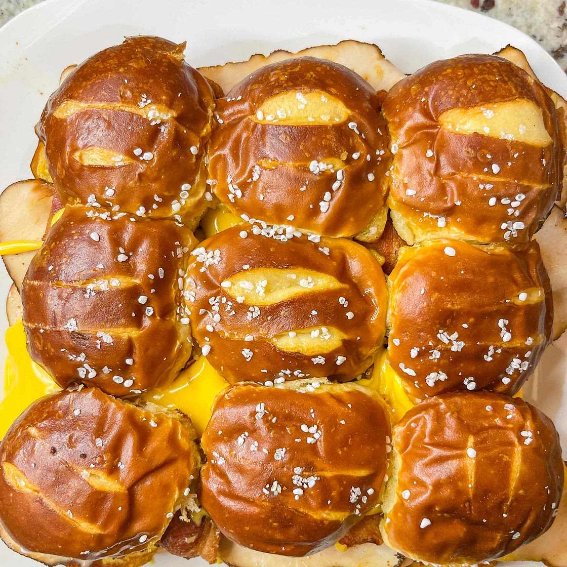 Cheesy Turkey Bacon Pretzel Sliders 