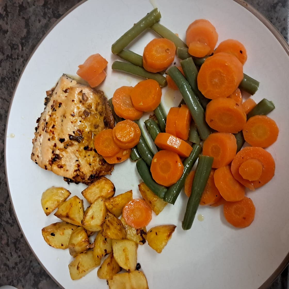 One Sheet-Pan Garlic Butter Salmon + Red Potatoes