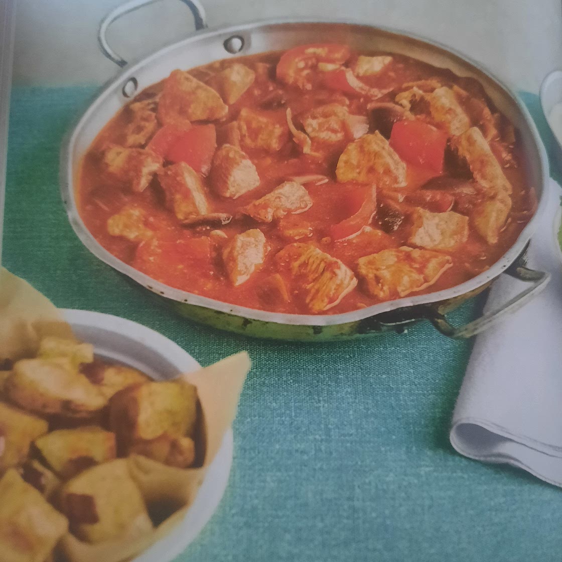 Chicken dopiaza with cumin roast potatoes