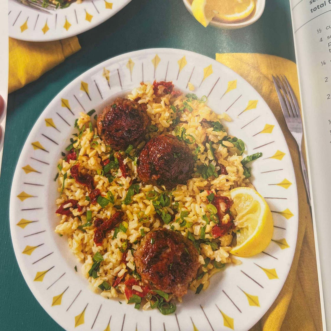 Lemony rice bowl with meatballs and sun-dried tomatoes