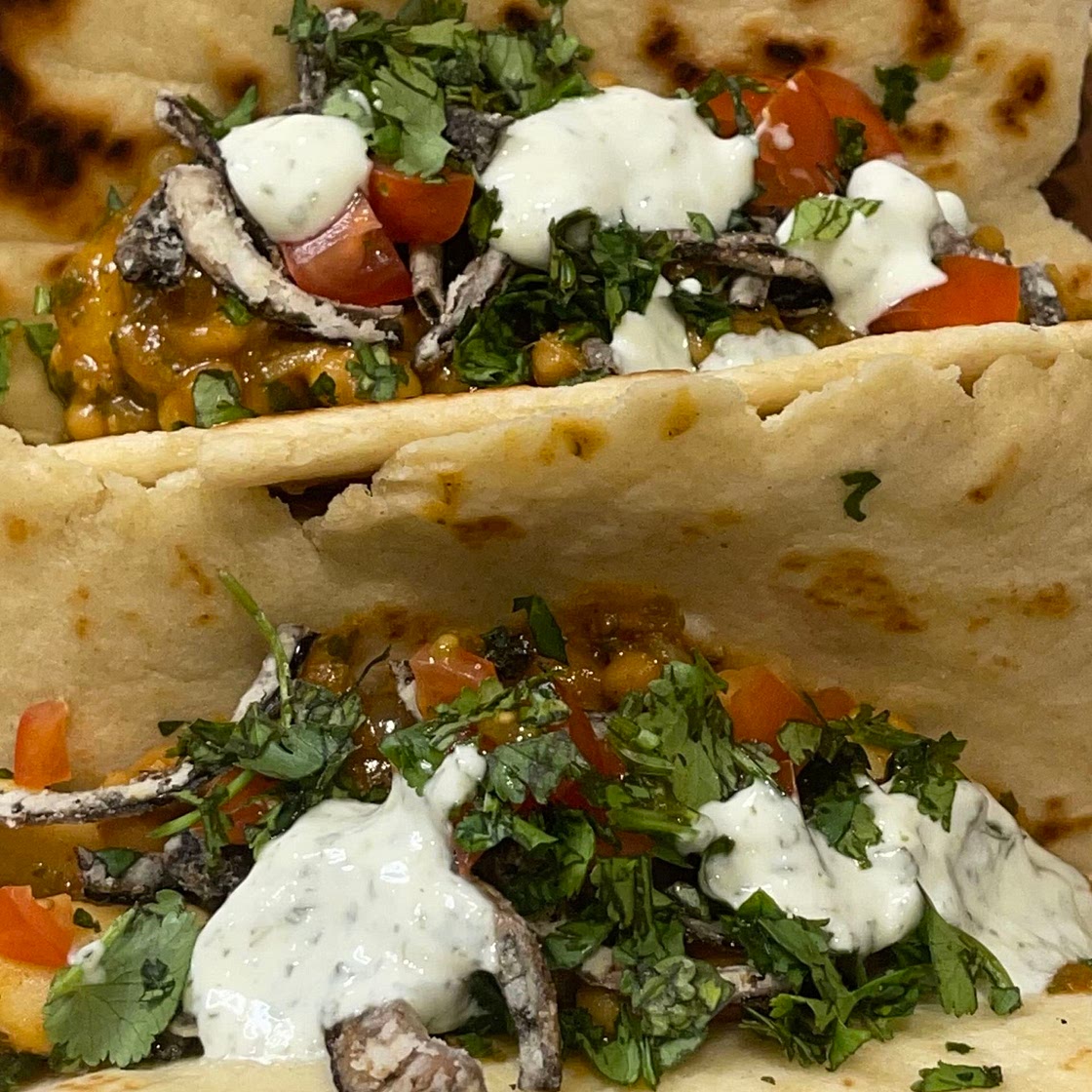 Bean bean curry Naan bread Tacos