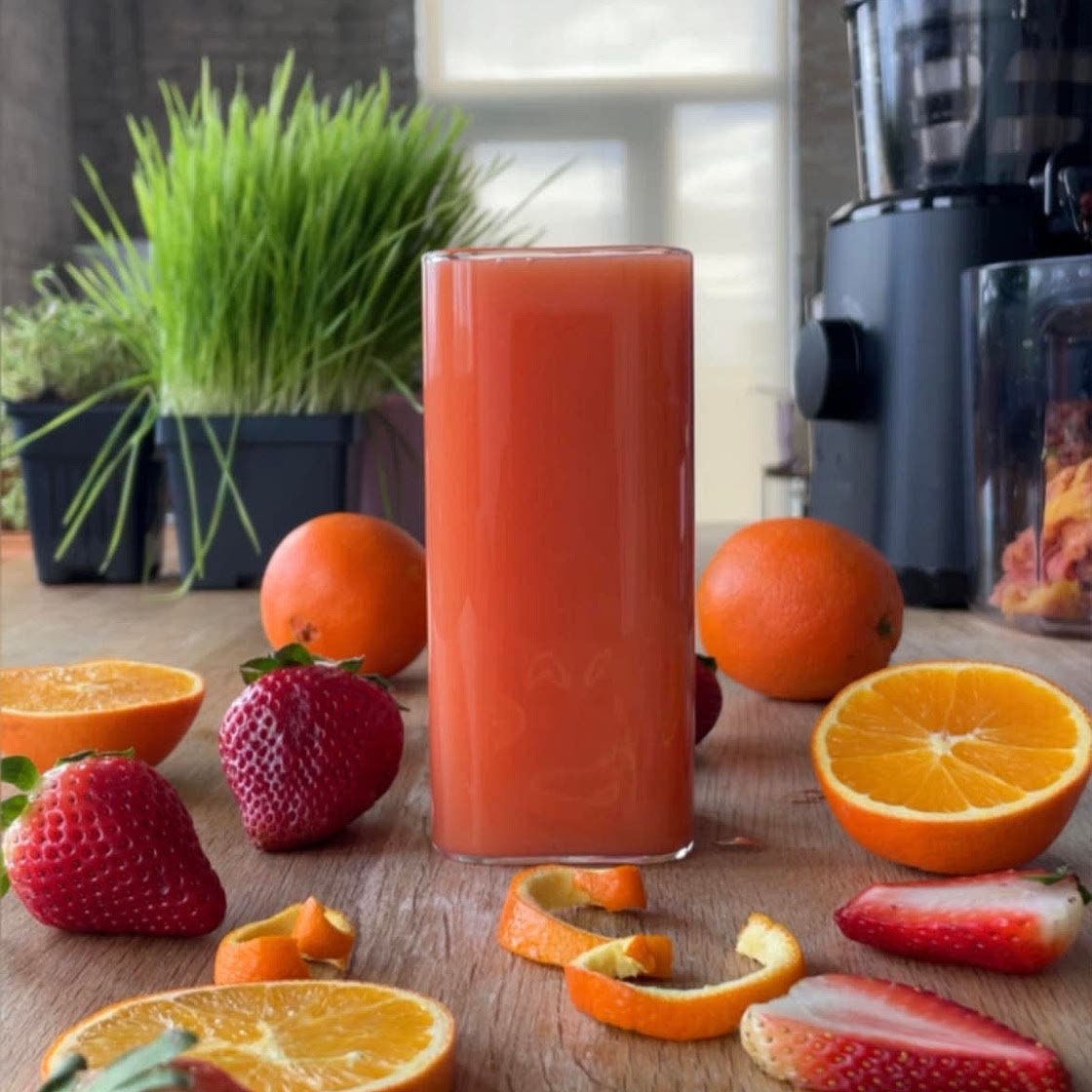 Orange Strawberry Juice in my juicer 