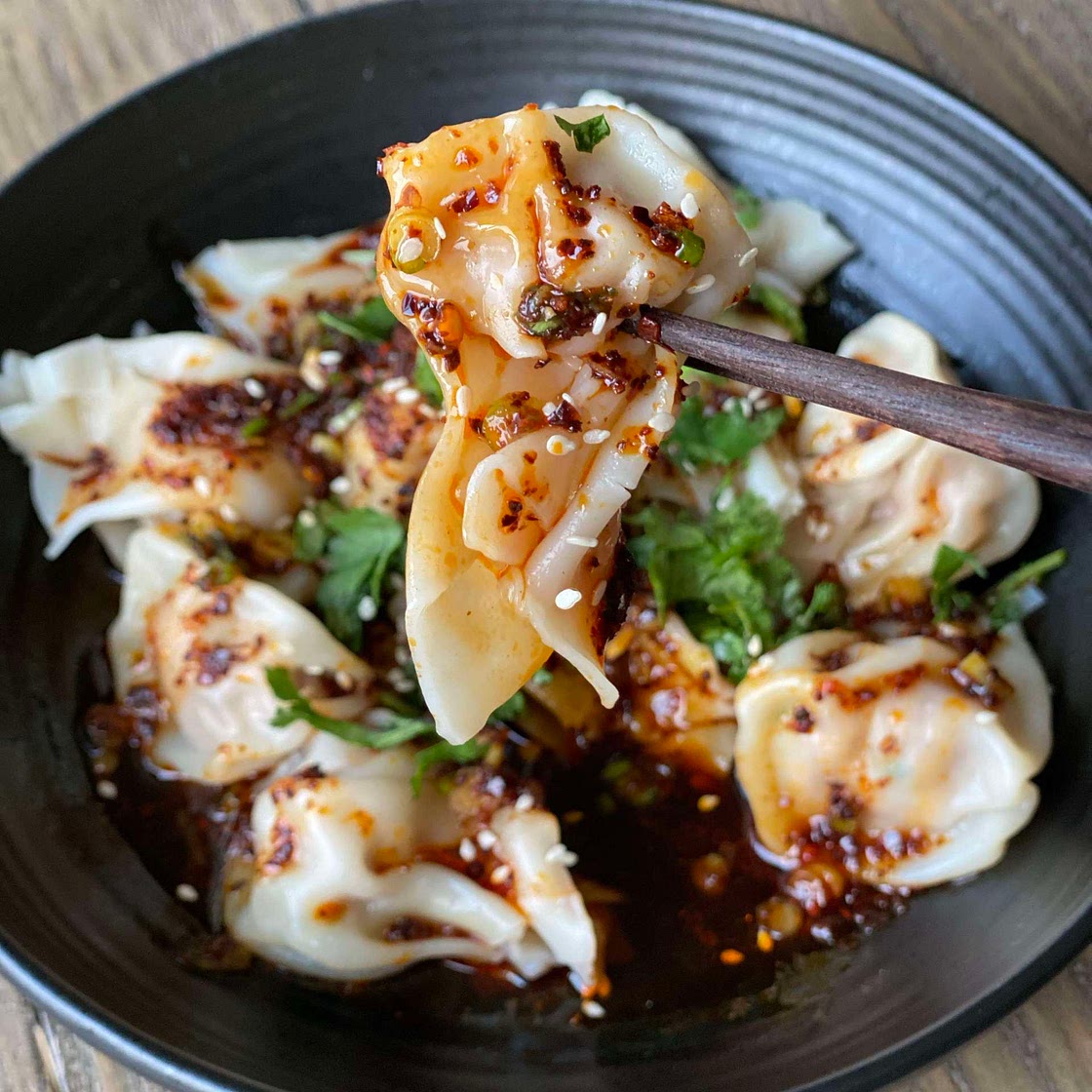 Shrimp and pork dumplings in a spicy chili sauce 