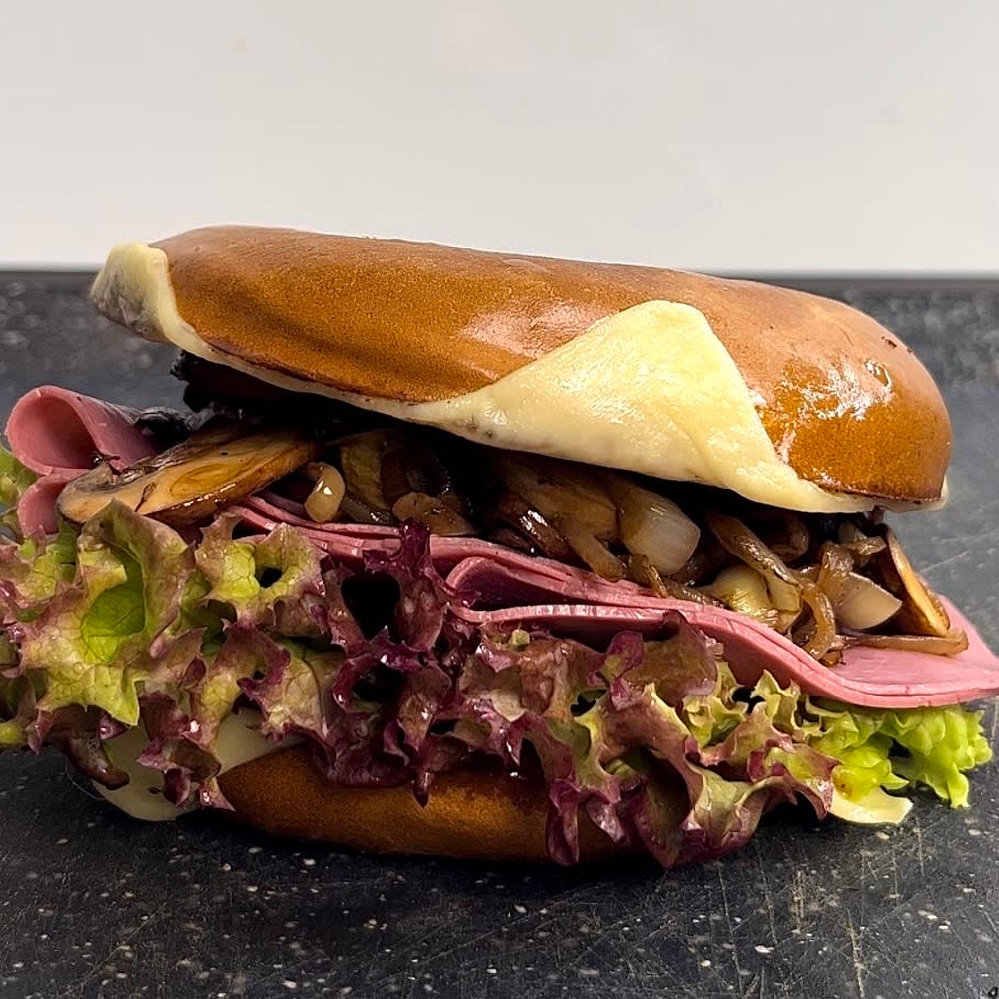 Cheesy ham and mushroom bagel