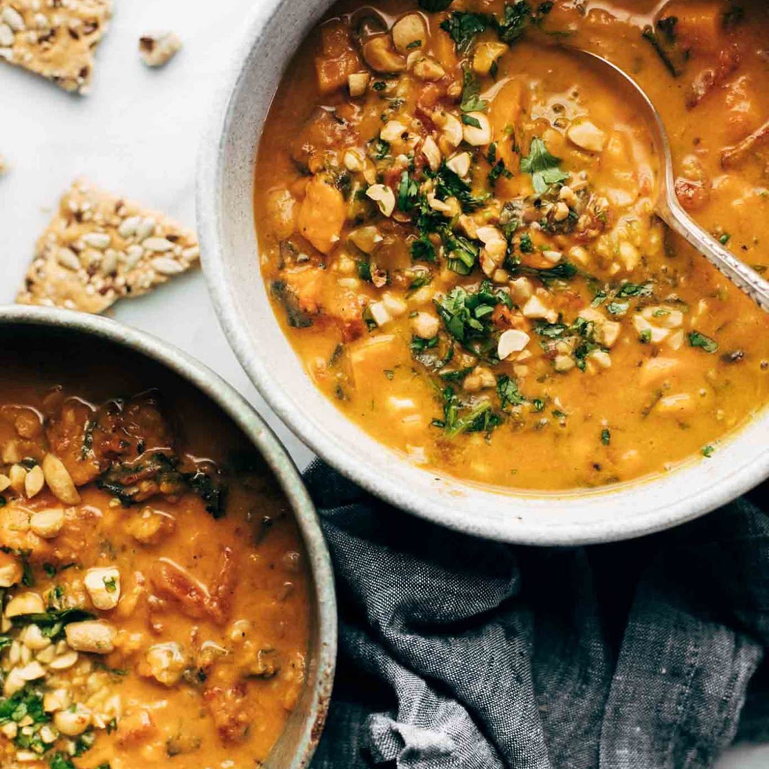 Spicy Peanut Soup with Sweet Potato + Kale