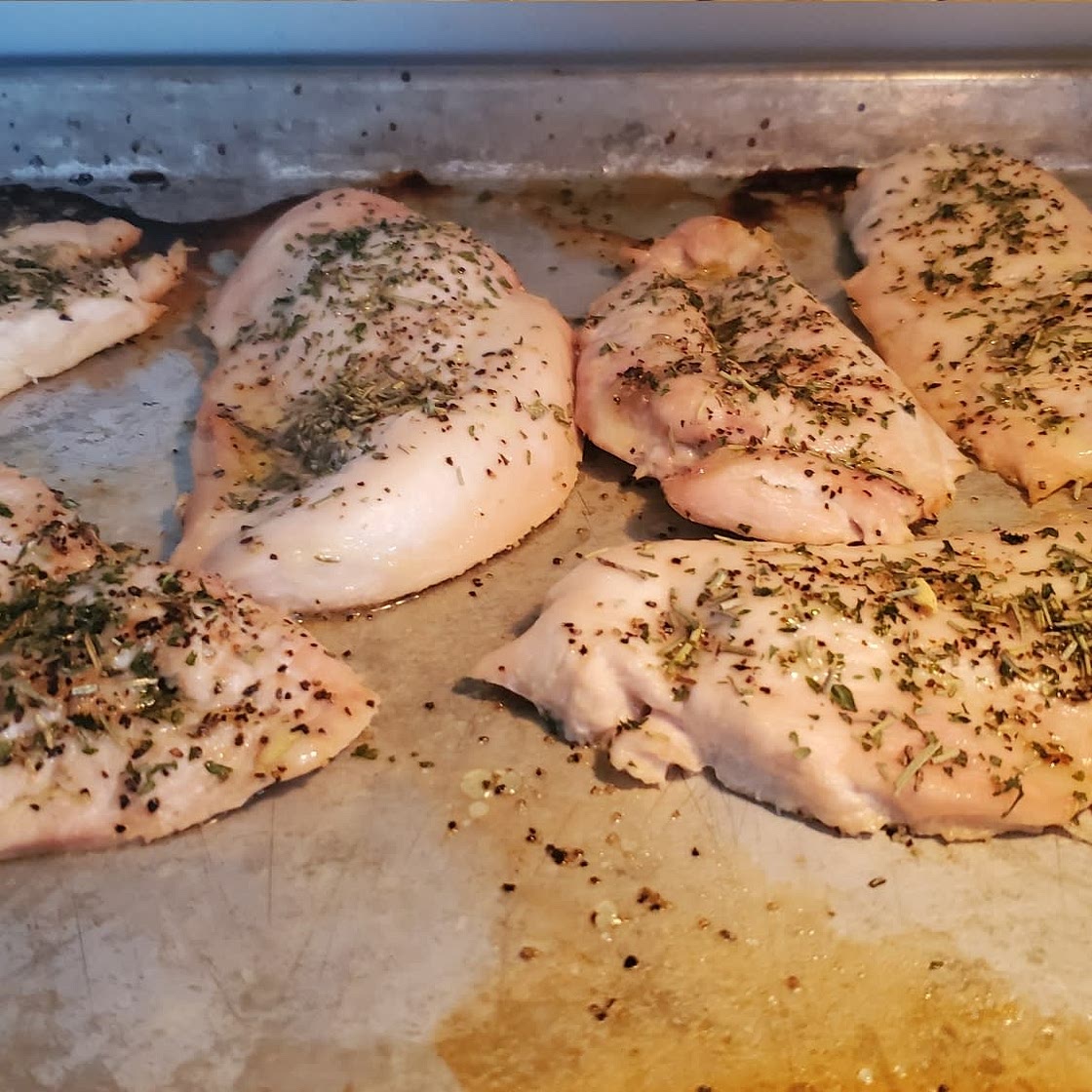 Baked chicken with lemon and fresh herbs