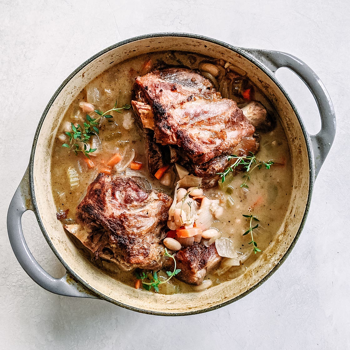 Braised pork shanks with white beans
