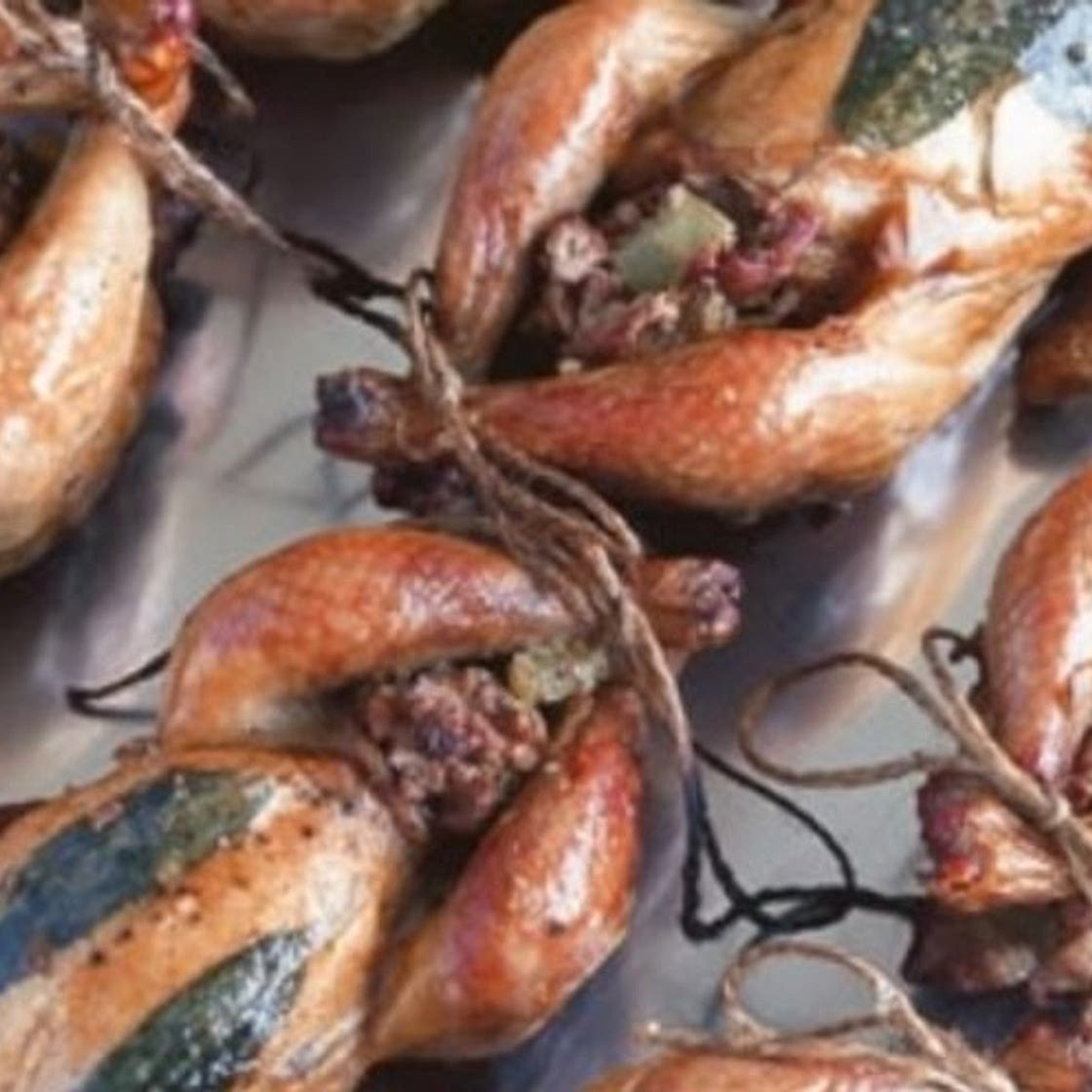 Barbecued poussins with chicken livers, capers & pancetta